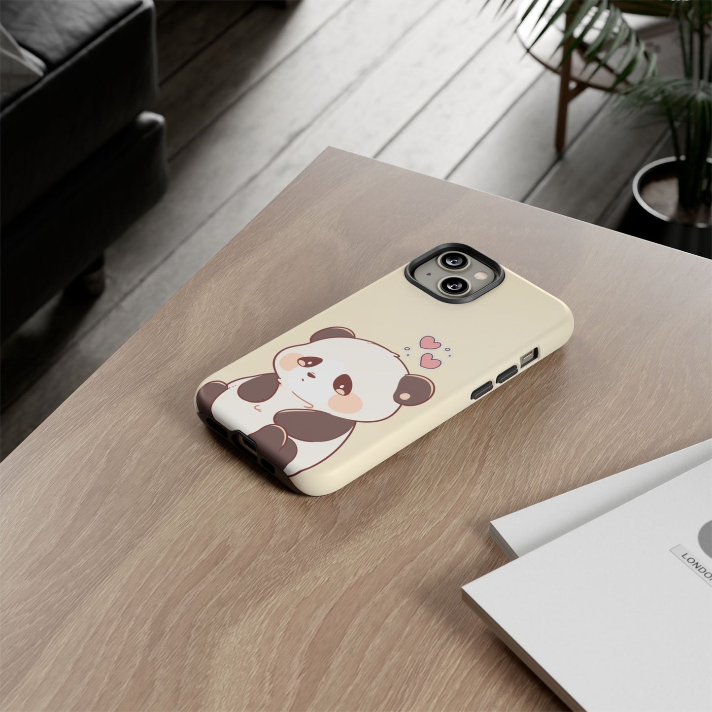 Kawaii panda iPhone case on wooden desk – lifestyle mockup with pastel design and pink hearts, ideal gift for animal lovers and cute phone accessory fans